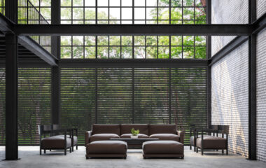 Loft style living room with nature view 3d rendering image.There